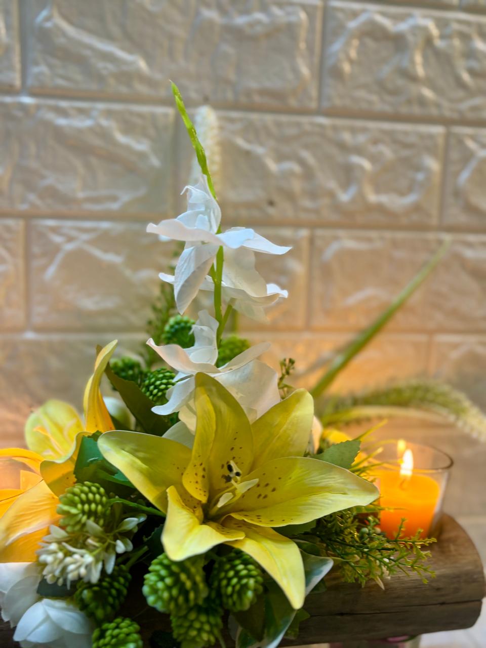 Golden Glow – Lily & Candle Floral Arrangement