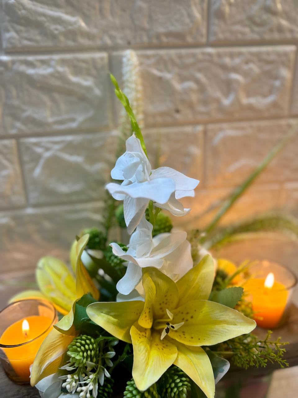 Golden Glow – Lily & Candle Floral Arrangement