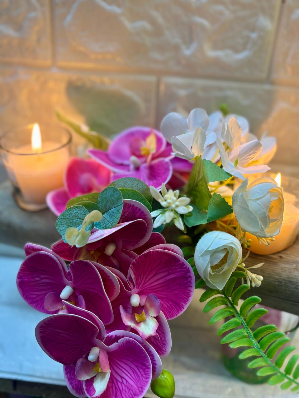 Petal Glow – Orchid & Candle Floral Arrangement