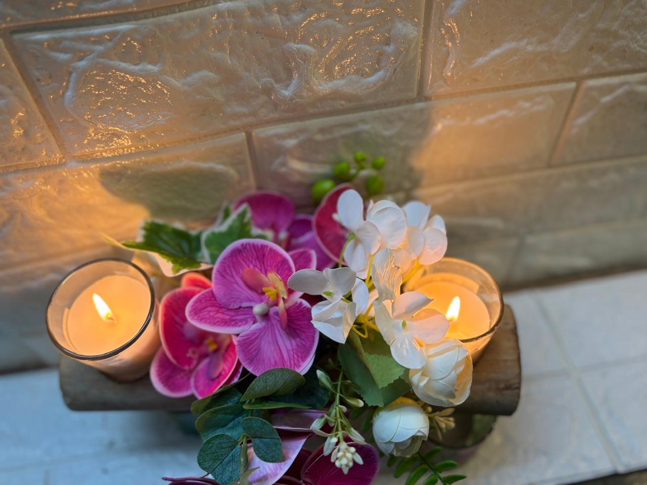 Petal Glow – Orchid & Candle Floral Arrangement